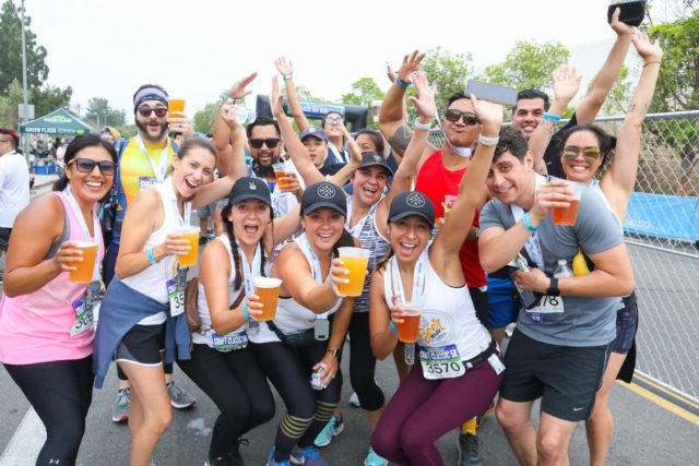 San Diego Running Co Craft Classic runner with finishers medal and beer!