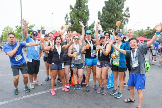 San Diego Craft Classic runners with finishers medal and beer!