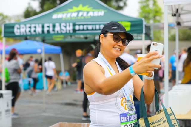 Craft Classic finisher in front of Green Flash breweries tent
