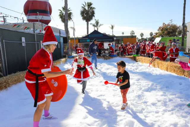 Kids having fun at the San Diego Santa Run